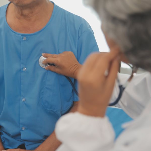 A doctor is examining patient at the clinic.